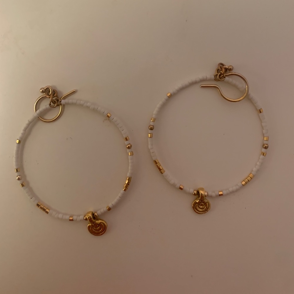White and gold earrings